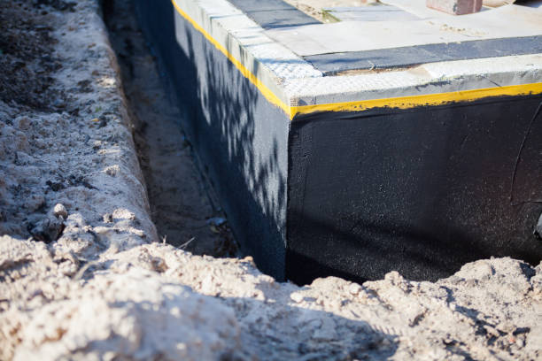 Professional Emergency Waterproofing technician working in Caroline, WI